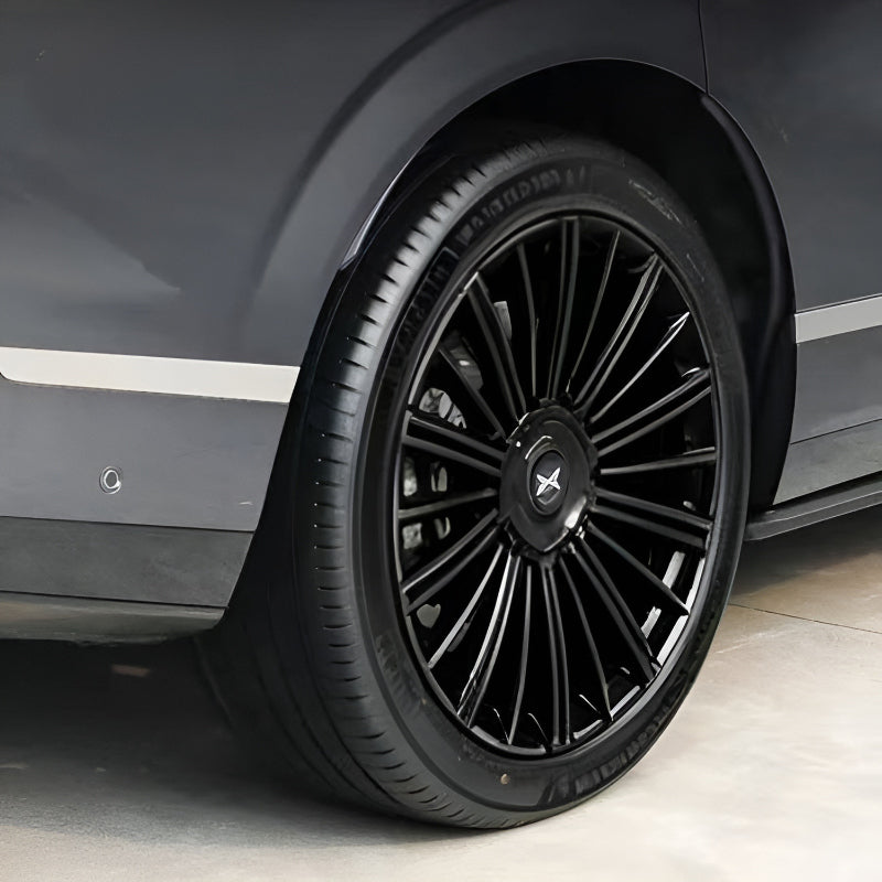 Side view XPENG GX car fitted with custom wheel hubcap black trim stickers